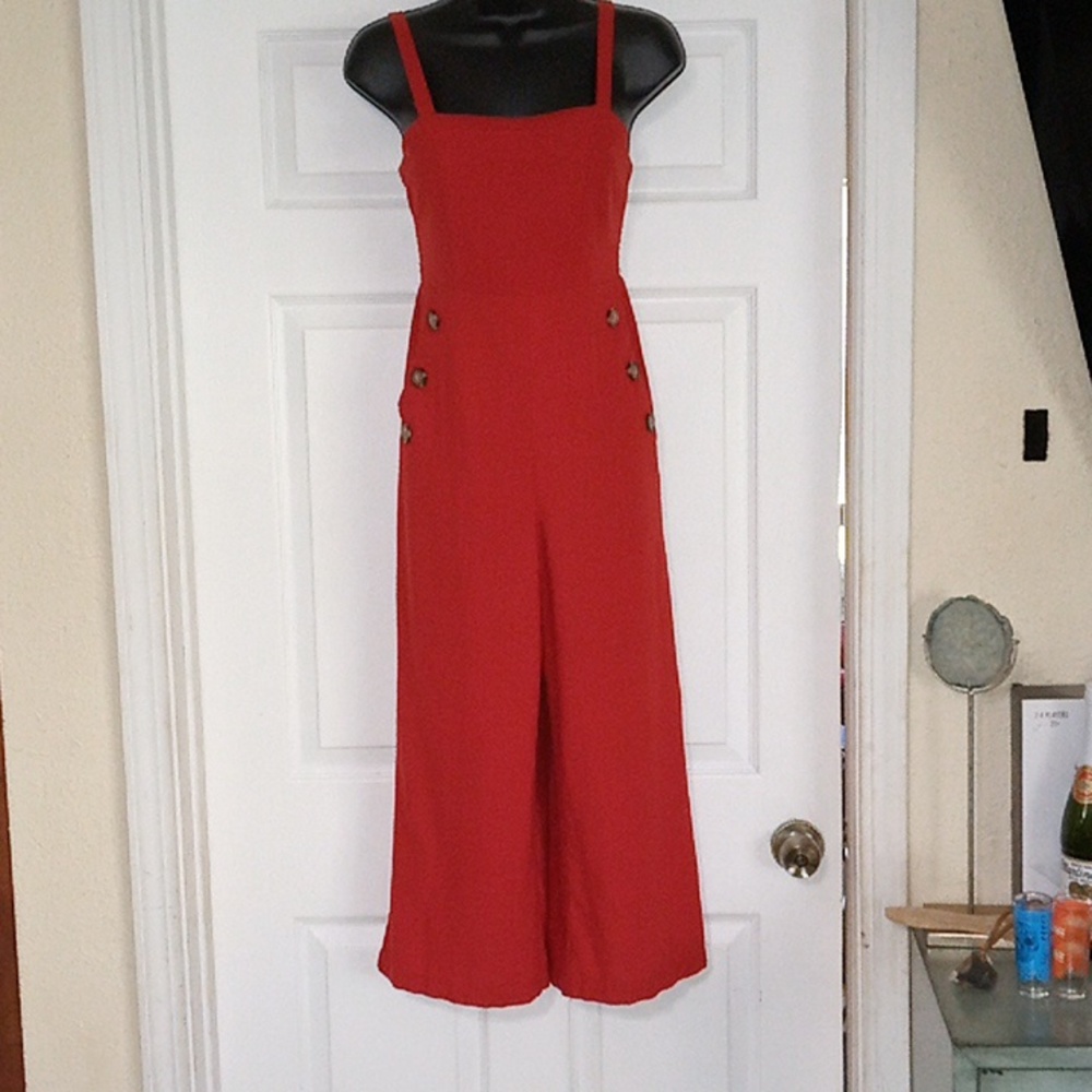 T•I•M•I•N•G, burnt orange overalls size small